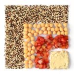 Quinoa salad ingredients with chickpeas and tomatoes