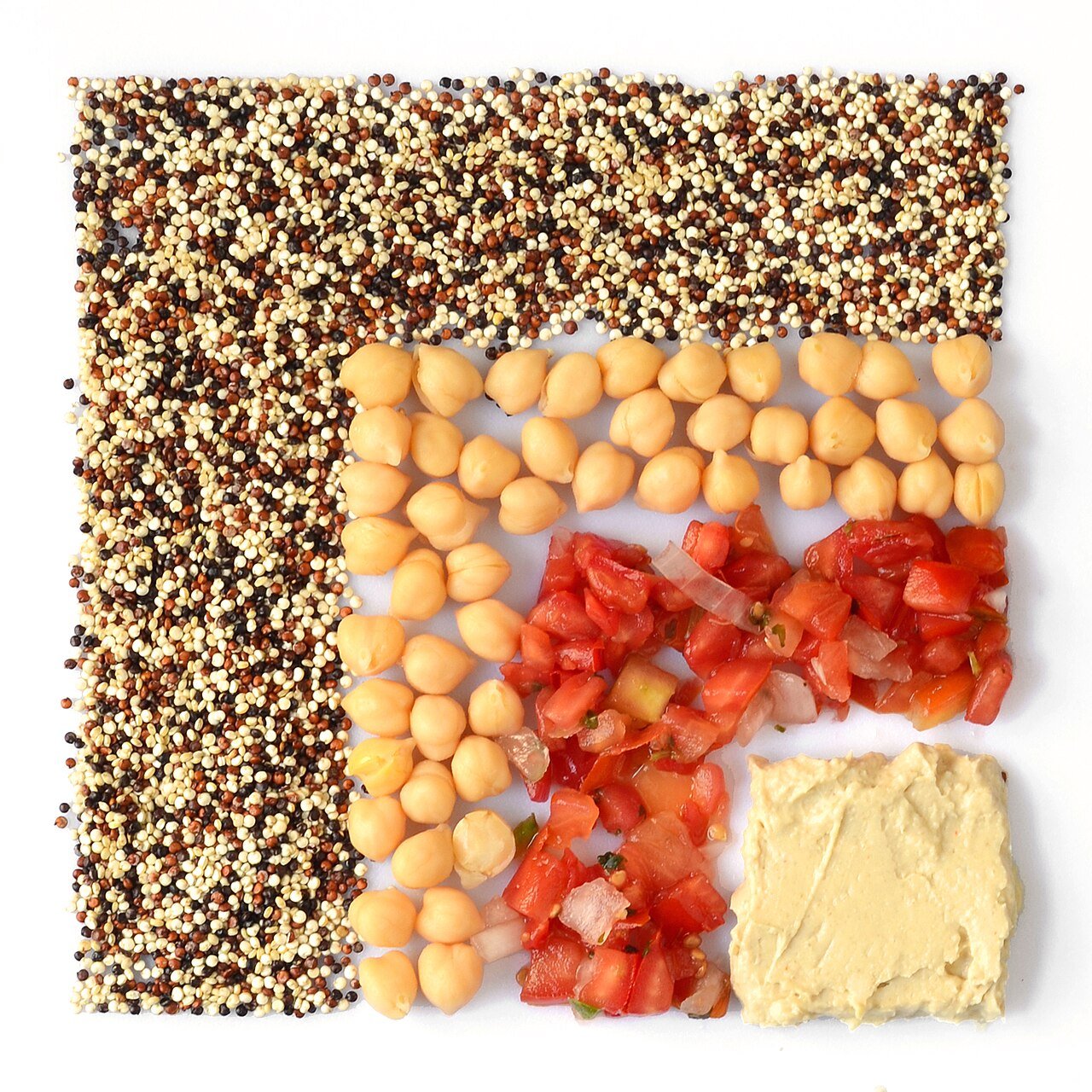 Quinoa salad ingredients with chickpeas and tomatoes